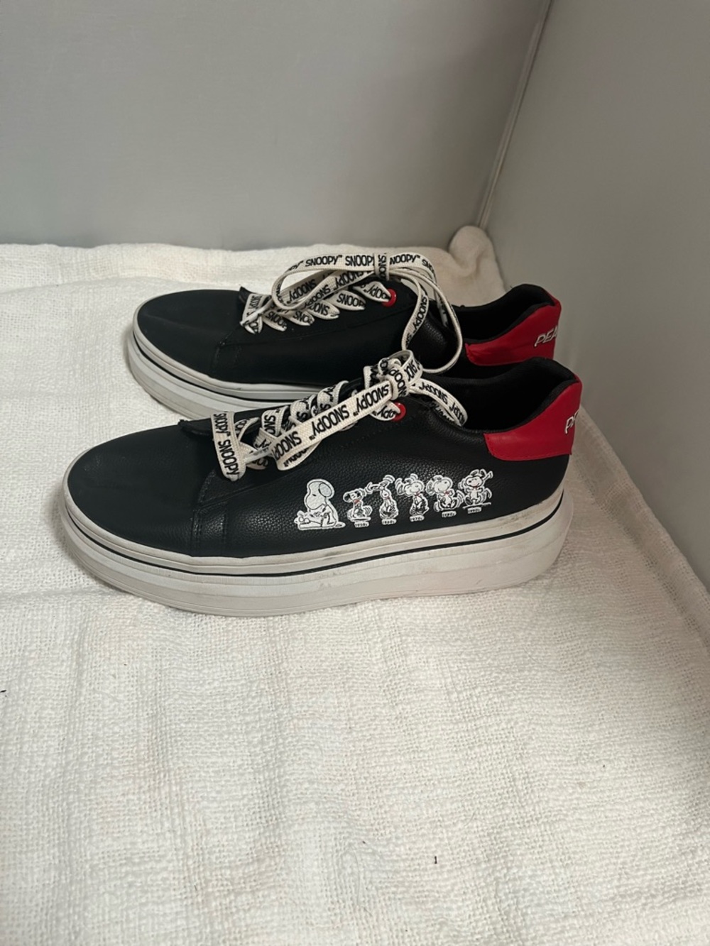 Peanuts Black Platform Sneakers with Red Heel Tab faux leather